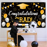 WATINC Graduation Background Banner 78" x 45" Extra Large Backdrops Congratulations Grad Cap Diploma Balloons Champagne Black Gold Party Decorations Supplies for Indoor Outdoor Photo Booth Props